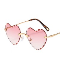 Trendy and fashionable new ladies heart shape frameless metal frame sunglasses